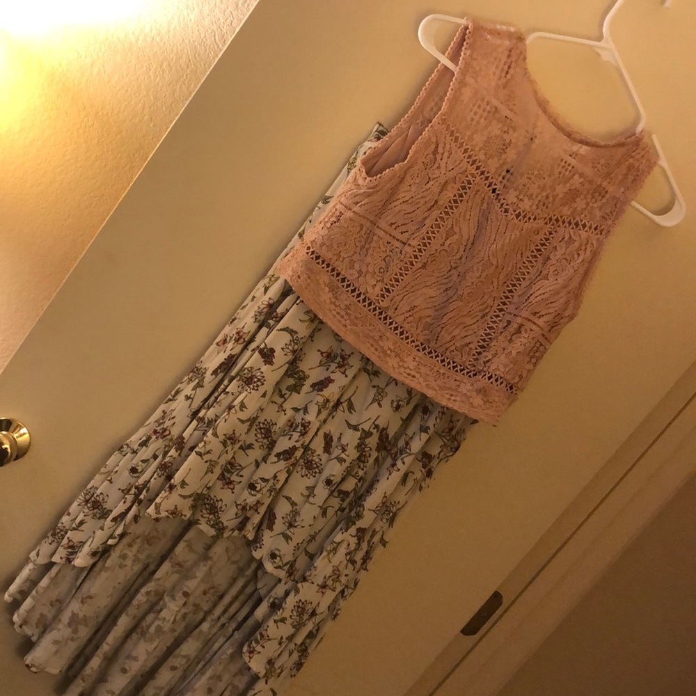 Crop top and high low skirt.